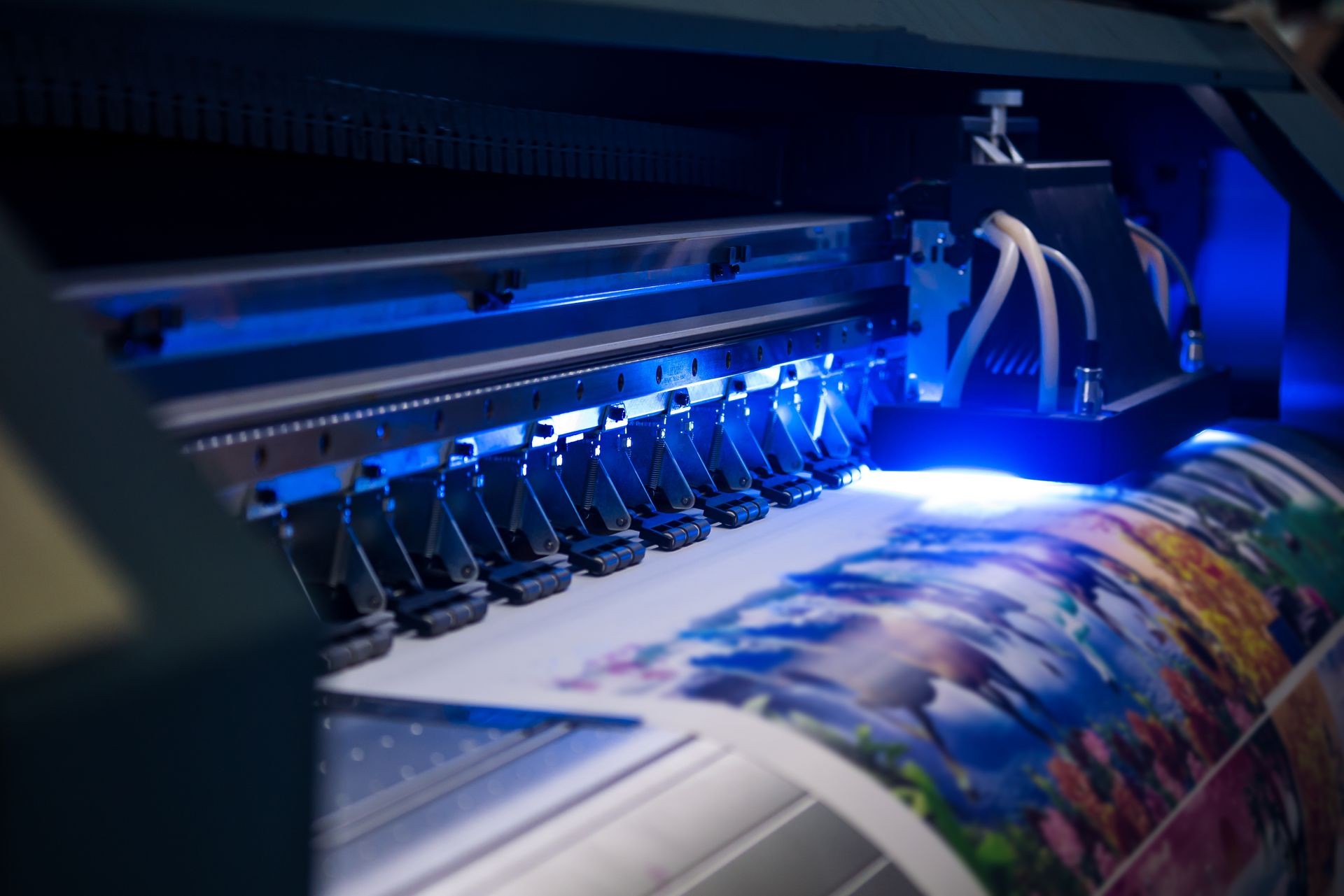 Gran formato, Close-up of inkjet printers in large machines.